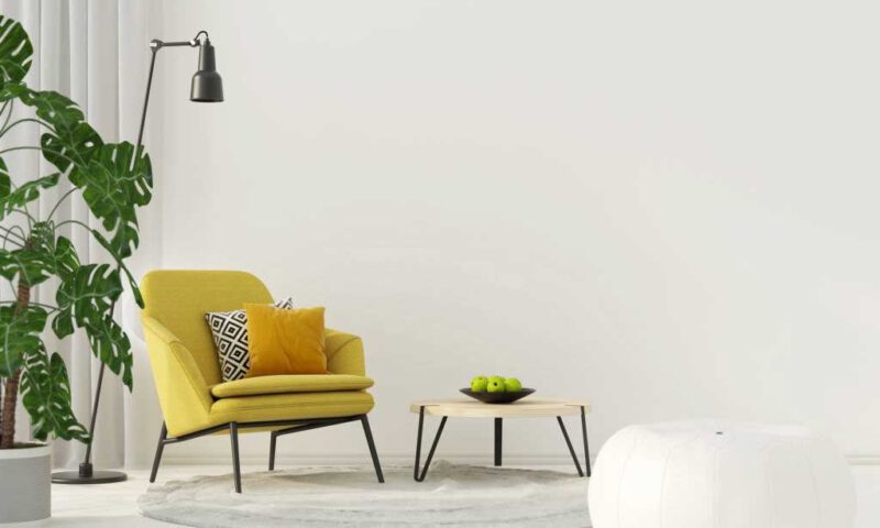 Gooseneck floor reading lamp with a yellow sofa